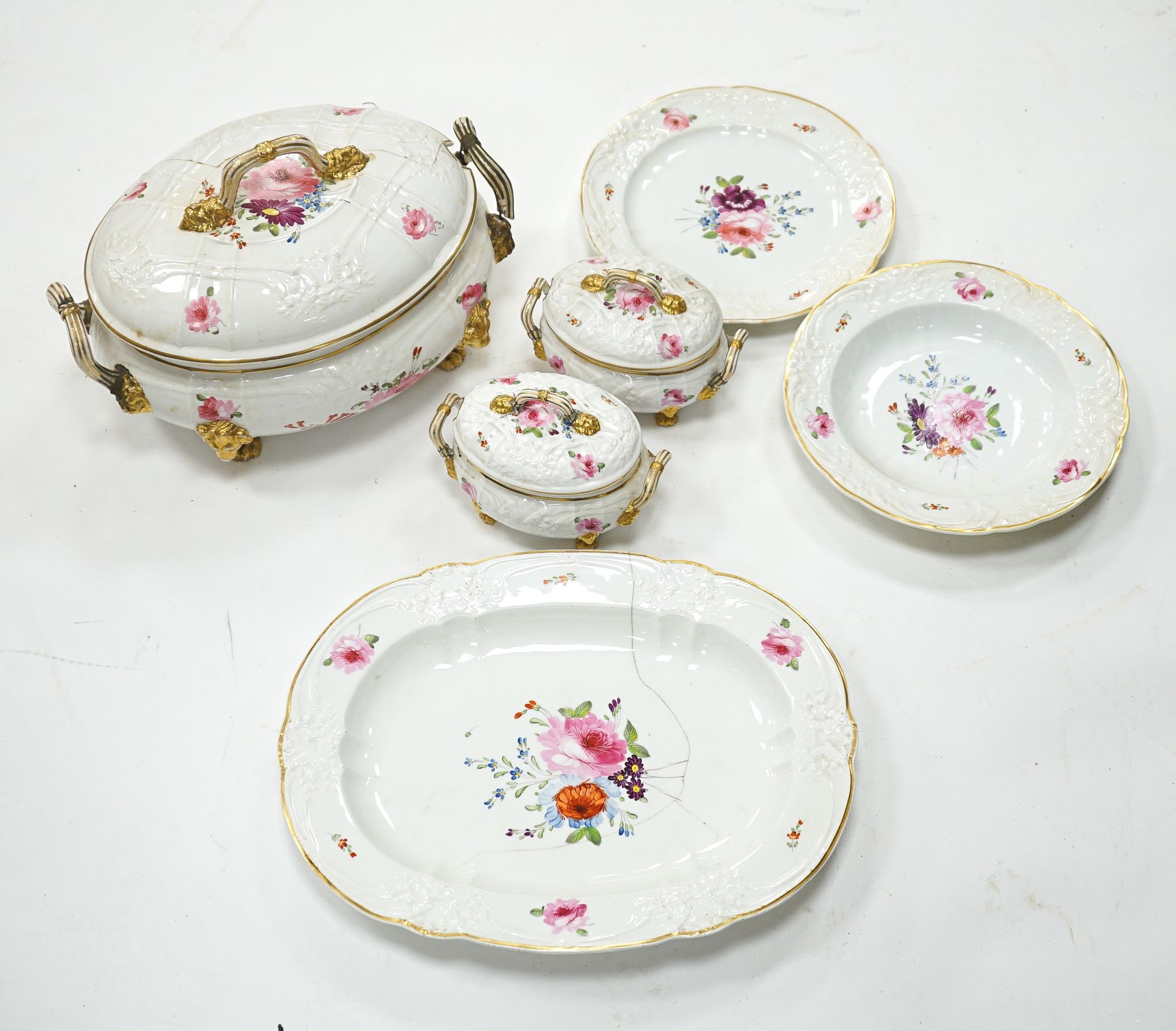 A 19th century floral painted part dinner service